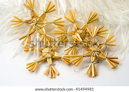 Decoration for Christmas tree - straw snowflakes