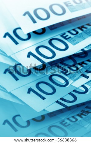 The money euro. Bundle of bank notes  and pen in blue color