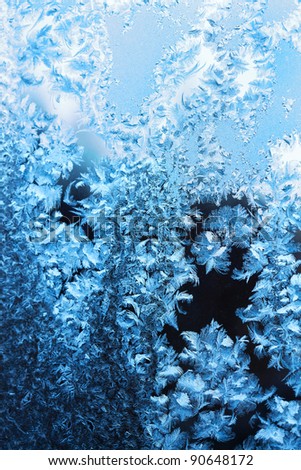 Frosty original  pattern at a winter window glass, natural texture