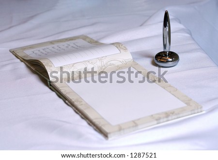 guest book with empty page and shallow DOF
