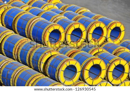 Stacked steel metal-roll ready for shipment in port