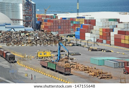 Cargo container, lumber and train in port Odessa, Ukraine