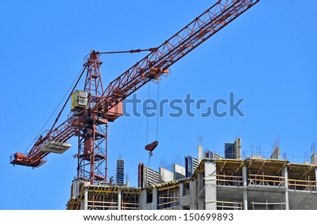 Concrete formwork and crane on construction site