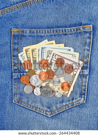 Money, coin and dollars in jeans pocket
