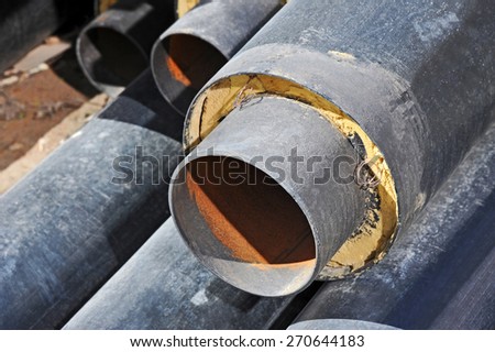 Steel pipe with heat insulation on construction site
