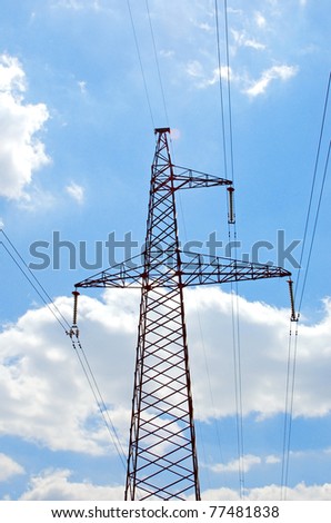 Electric lines pylon on blue sky background