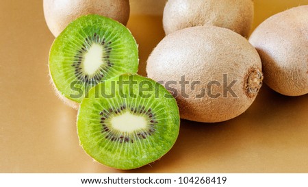 kiwi fruit on gold background