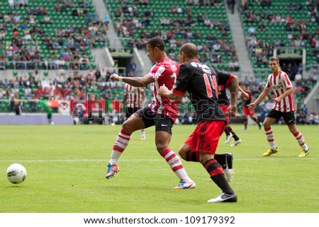 WROCLAW, POLAND - JULY 22: Final game in Polish Masters soccer tournament between PSV Eindhoven and Benfica Lisboa 3:1 on July 22, 2012 in Wroclaw, Poland