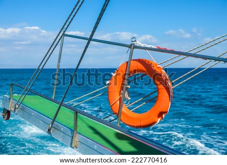lifebuoy hanging HB raised the ladder to sail a ship at sea
