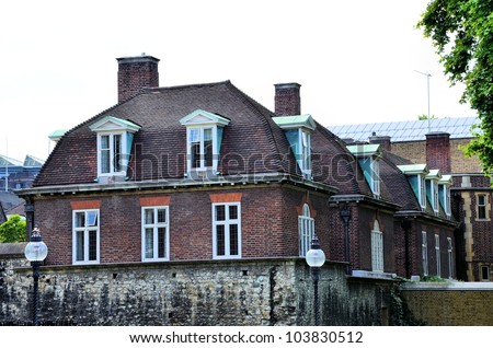 Traditional british building with many big windows