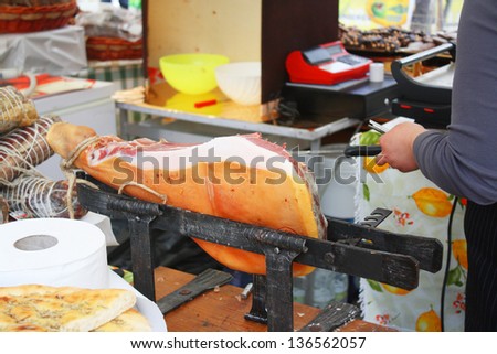 Italian ham prosciutto at the butchery, farm butcher shop