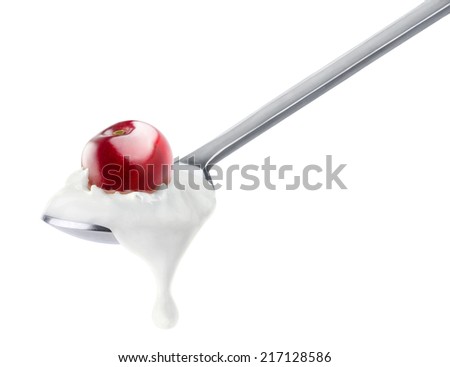 Spoon of cherry yogurt isolated on white
