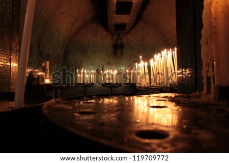candles with flame inside the church, cathedral marseilles, france