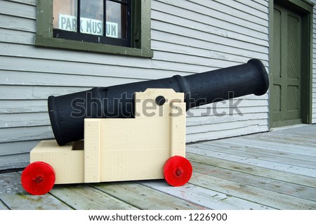a toy cannon made of wood
