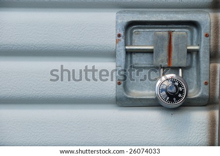 garage door at a self storage facility with a padlock on it