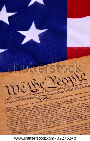 Preamble to the US Constitution with the stars and stripes in the background