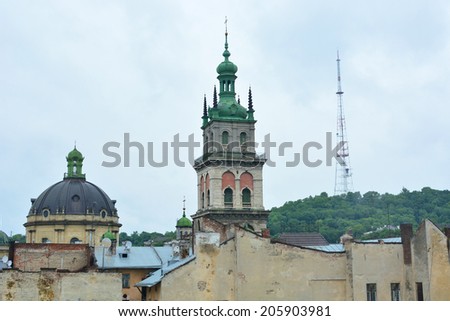 Panorama of old Ukrainian city Lviv: The Dominican church, Korniakt Tower, Castle Hill and tv tower