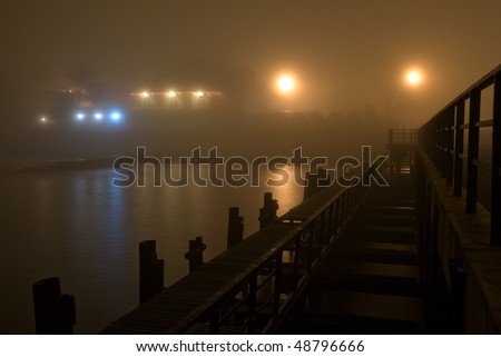 Foggy quay of a city of (Adler), night, Black Sea