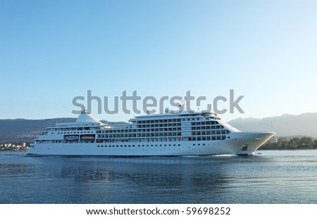 Cruise ship sailing into port in the early morning light