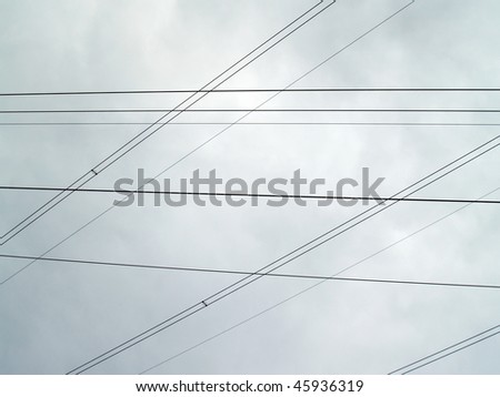 many wire cables crisscrossing the sky above