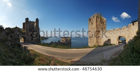 Golubac Fortress 180(deg) xxl panorama.  12th century castle located at the entrance of river Danube IRON GATE  gorge. you can see two main towers with gates and fortified river dock