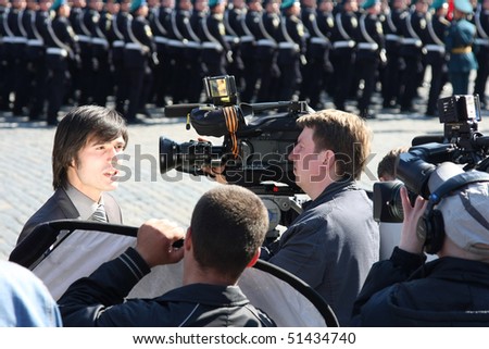 MOSCOW, RUSSIA - MAY 9: Journalist making stand-up on the Victory Parade. May 9, 2009. Moscow. Russia.