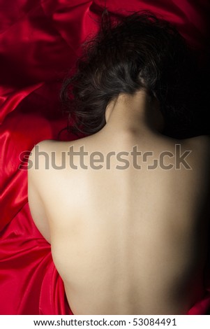 Naked Back of a Girl with Red Satin