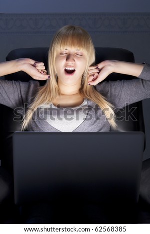 Yawning Woman with Laptop