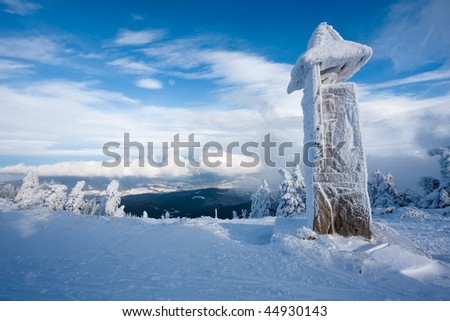 iced mountain bell tower