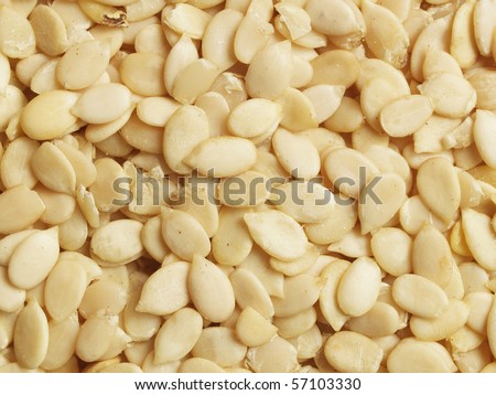 Raw dried melon seeds - close up, can be used as a background