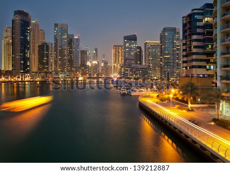 Skyscrapers Of Dubai Marina Captured In The Dusk. Dubai Marina Is An Artificial Canal City, Carved Along A Two Mile Stretch Of Persian Gulf Shoreline.