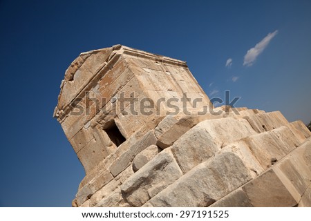 Diagonal shot from tomb of Cyrus in Pasargadae of Iran against blue sky.