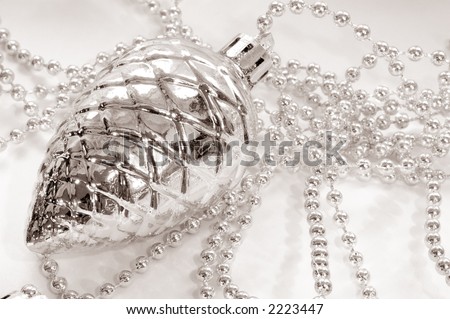 different christmas decoration on white background. silver cone