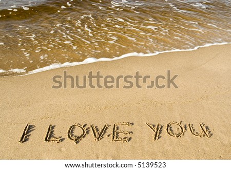 i love you - love message on gold sand