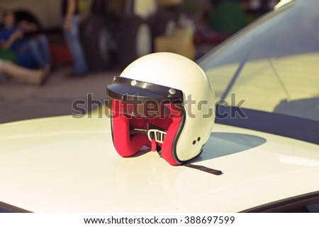 White racing helmet on a sport car