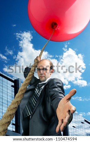 Businessman inviting you to fly up by big red balloon