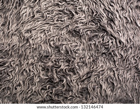Background of a cheap faux fur