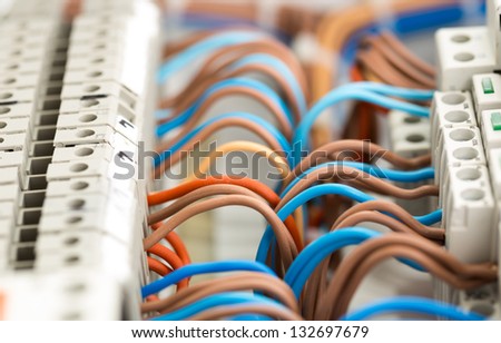 Closeup of electrical wires in switchgear cabinet