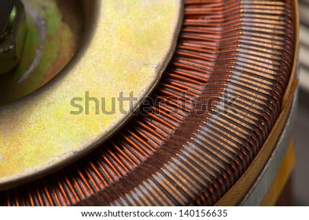 Closeup of copper inductor in electrical transformer