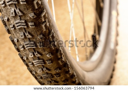 Muddy tire of a mountain bicycle