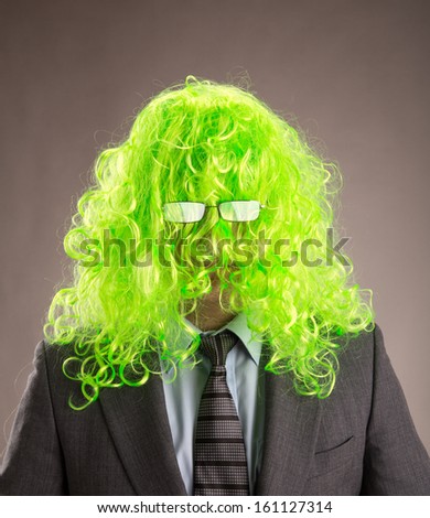 Businessman with a long hair green wig