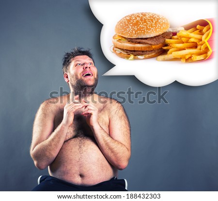Fat funny man dreaming about  hamburger