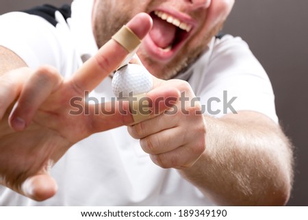 Slingshot making on mans fingers