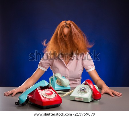 Exhausted woman with colorful phones