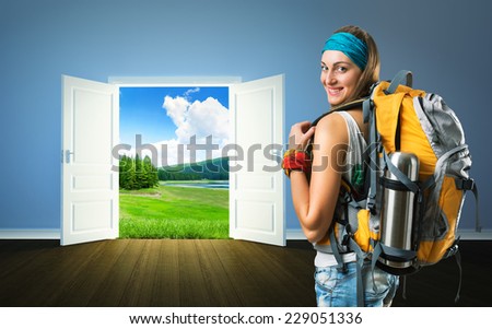 Traveler woman is going to nature doors