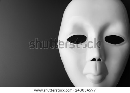 Theater mask on grey