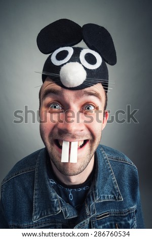 Strange man with mouse ears
