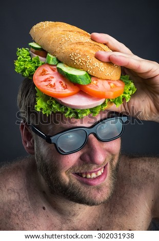Man with sandwich on his head