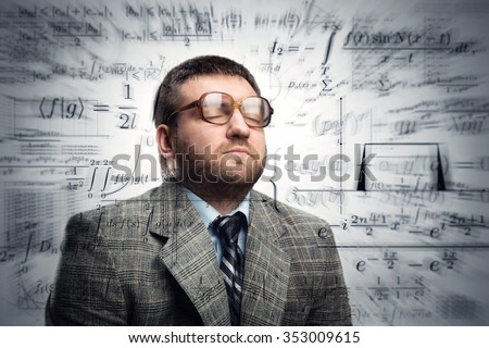 Professor in glasses thinking about math formulas