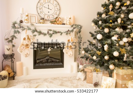 Christmas interior with fireplace and xmas tree.